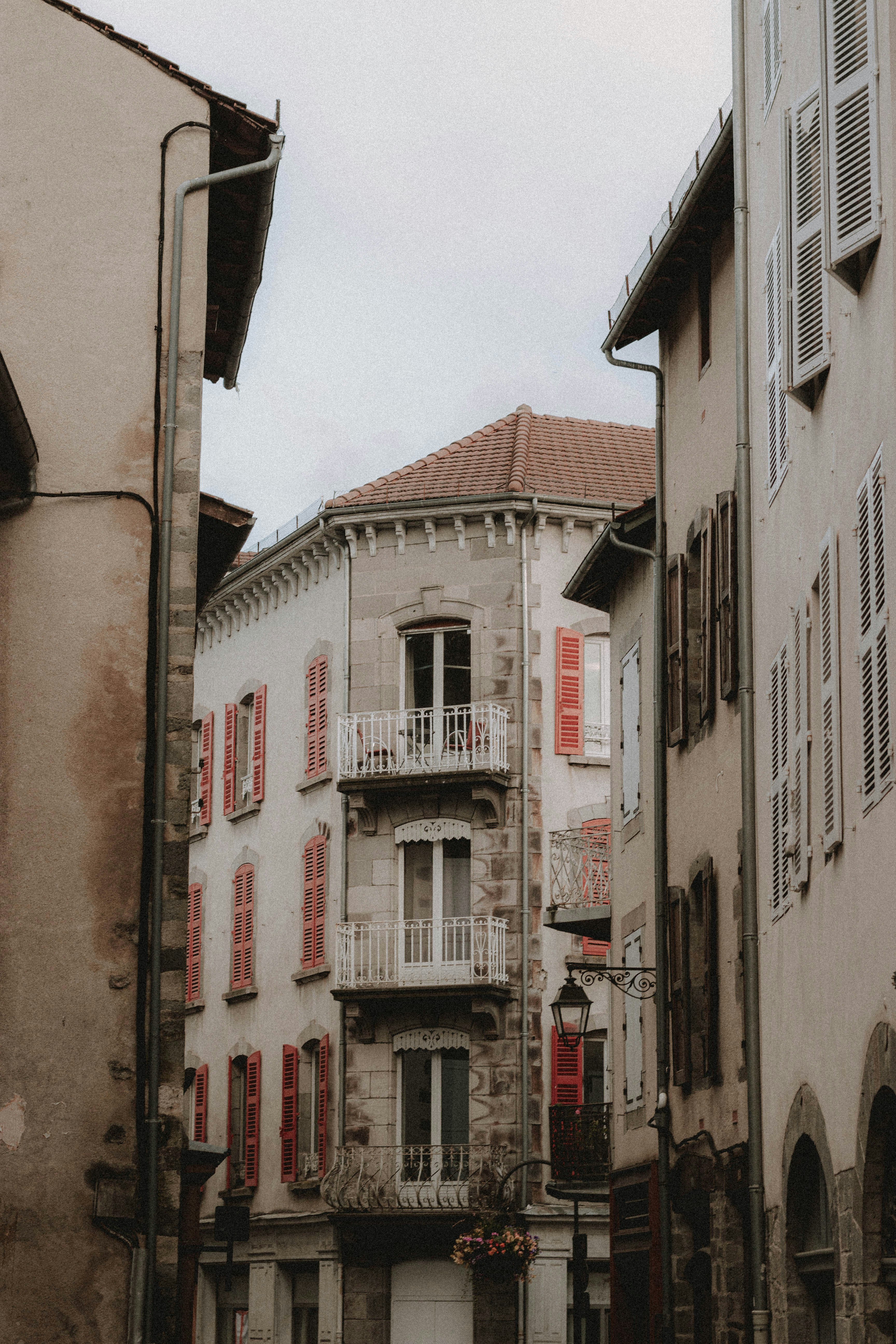 white and red concrete building during daytime